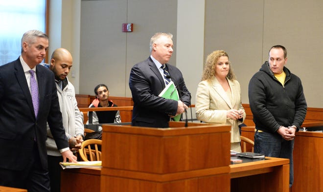 From left, defense attorney Timothy Shyne, with his client Roberto Perez, with defense attorney's John McLaughlin and Georgia Petropolos, with their client Kevin O'Brien, during a dangerousness hearing in Brockton District Court on Wednesday, Jan 3, 2018. The men are charged with armed assault with intent to murder related to the shooting of Richard Chiappini at his Bridgewater home on Dec. 23, 2017. (Marc Vasconcellos/The Enterprise)