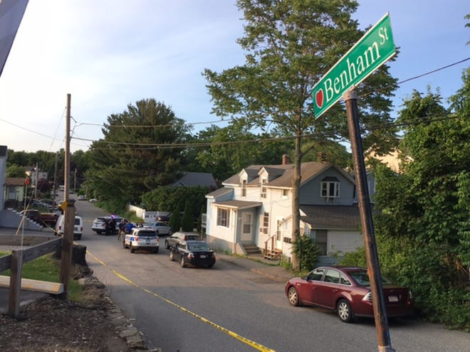 A stretch of Benham Street in Worcester is cordoned off Saturday as police investigate a shooting. [T&G Staff/Winston W. Wiley]