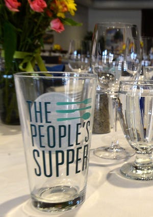 The People's Supper initiative brings diverse groups of local residents together at different locations for a shared meal and conversation. [JACK HANRAHAN/ERIE TIMES-NEWS]