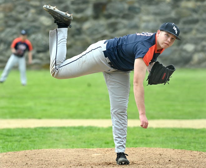 AMSA's Kevin Macauley follows through on a pitch to St. Bernard's at Stevens Park in Marlborough this past spring. Macauley helped Hudson Post 100 beat Medford on Saturday. [Daily News and Wicked Local Staff File Photo/Ken McGagh]