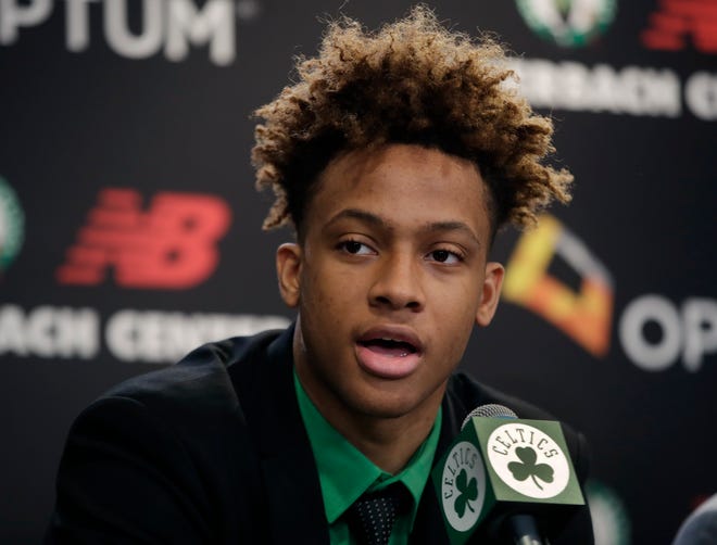 Boston Celtics 2019 NBA basketball draft player, Romeo Langford speaks during a news conference to introduce the new team players, Monday, June 24, 2019, in Boston. (AP Photo/Elise Amendola)