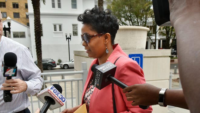 Suspended Jacksonville City Council member Katrina Brown, photographed entering federal court early this year, is scheduled to stand trial in August on fraud charges centered around a small-business loan for her family to construct a barbecue sauce plant. [Will Dickey/Florida Times-Union]
