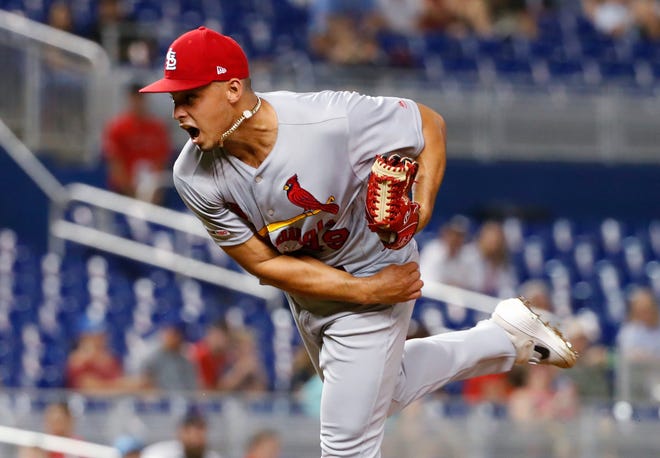 St. Louis Cardinals' Jordan Hicks delivers a pitch during the ninth inning of a baseball game against the Miami Marlins, Monday, June 10, 2019, in Miami. (AP Photo/Wilfredo Lee)