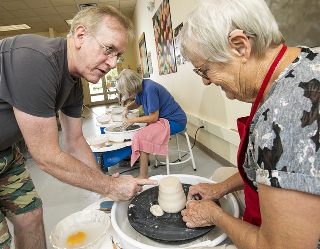 Marion County's population grew 1.8% between 2017 and 2018. This photo, taken earlier this month, shows student Vera Mangold getting a little help from instructor Greg Gwilt during a pottery class at Master the Possibilities at On Top of the World. [Doug Engle/Ocala Star-Banner]