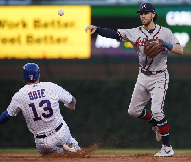 Atlanta's Dansby Swanson and the Braves will play at Wrigley Field against the Cubs Wednesday in a game set to be broadcast by FSSE at 8 p.m., [Jim Young/Associated Press]