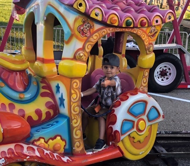 SUBMITTED PHOTO 



Bo Stein, 2, has fun on a ride during Tusky Days.