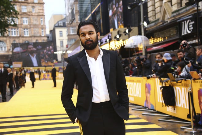 Actor Himesh Patel poses for photographers upon arrival at the premiere of the film 'Yesterday' in London, Tuesday, June 18, 2019. [Photo by Joel C Ryan/Invision/AP]