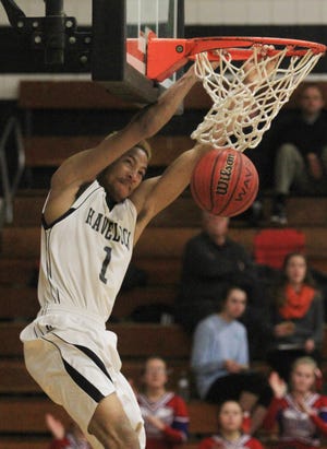 Former Havelock basketball star Kyran Bowman dunks during his high school days. Friday, Bowman signed a one-year deal with the Golden State Warriors after going undrafted in Thursday's NBA Draft. [SUN JOURNAL FILE PHOTO]
