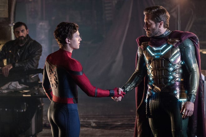 Jake Gyllenhaal, right, plays Quentin "Mysterio" Beck opposite Tom Holland's Peter Parker, middle, in "Spider-Man: Far From Home." [Contributed by Jay Maidment/Sony Picture Entertainment Inc.]