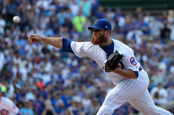 Chicago Cubs closer Craig Kimbrel throws to an Atlanta Braves batter during the ninth inning Thursday at Wrigley Field. [NAM Y. HUH/THE ASSOCIATED PRESS]