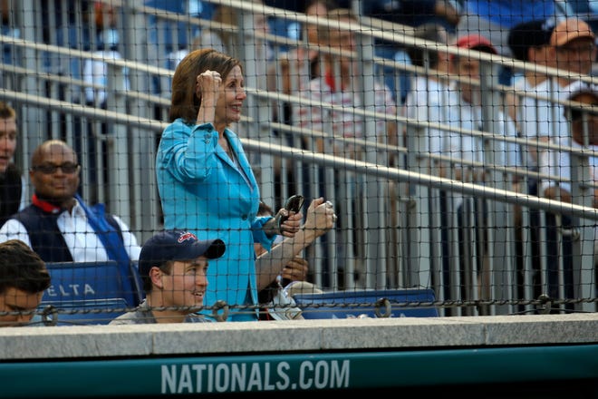 House Speaker Nancy Pelosi of Calif., cheers during the Congressional Baseball Game at Nationals Park in Washington, Wednesday, June 26, 2019. (AP Photo/Carolyn Kaster)