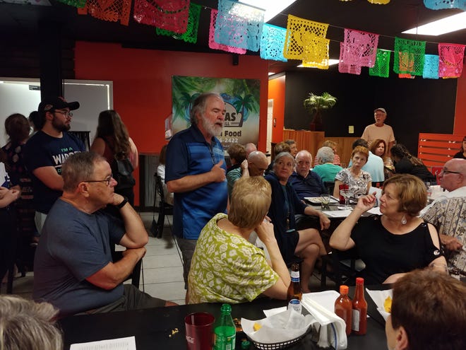 Bob Donelson, chair of the Sun City Democrats, speaks to locals who attended a Democratic presidential debate viewing at Las Palmas Restaurant in Okatie on Wednesday. [Dan Hunt/Bluffton Today]