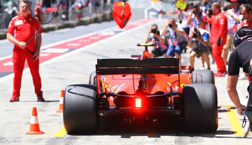 Ferrari driver Charles Leclerc of Monaco gets a pit service during the third free practice session for the Austrian Formula One Grand Prix at the Red Bull Ring racetrack in Spielberg, southern Austria, Saturday, June 29, 2019. The race will be held on Sunday. (AP Photo/Ronald Zak)