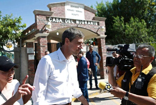 Democratic presidential candidate Beto O’Rourke leaves a migrant shelter, followed by the press on the Mexico-US border in Ciudad Juarez, Mexico, Sunday, June 30, 2019. In his first international trip as a White House hopeful, the former congressman traveled across the Rio Grande from his native El Paso, Texas, to meet immigrants who say they fled Central American violence and turmoil to seek asylum in the U.S., but were turned away at the border. (AP Photo/Christian Chavez)