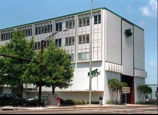The former First Union bank and office building as it appeared in 1995, shortly before Manatee County bought it. The county intends to negotiate with NDC Development Co., which offers to acquire the long vacant and deteriorating structure for $100,000. NDC intends to raze the five-strory building and replace it will an eight-story building with retail, offices and work force-priced apartments. {Herald-Tribune archives]