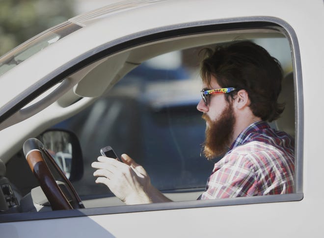 A ban on texting and driving in Florida begins Monday, but warnings won't be handed out until Oct. 1 and the first tickets will be written Jan. 1. [Associated Press/LM Otero]