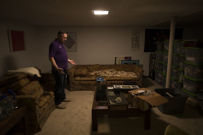 Mark Lawrence suffers from post-traumatic stress disorder from his Vietnam War service. He uses a service dog and his isolated basement to protect him from triggers like Fourth of July fireworks. Lawrence is pictured here in his basement on Friday, June 28, 2019, at his Midlothian Way home in Rockford. [SCOTT P. YATES/RRSTAR.COM STAFF]