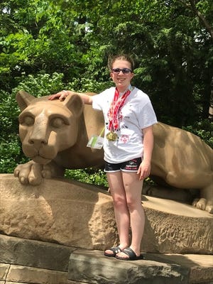 Abigail Woodling, of Abington, competing for the Montgomery County Special Olympics Gymnastics team, won five gold medals at the Pennsylvania State Special Olympics games in June at Penn State. [CONTRIBUTED]