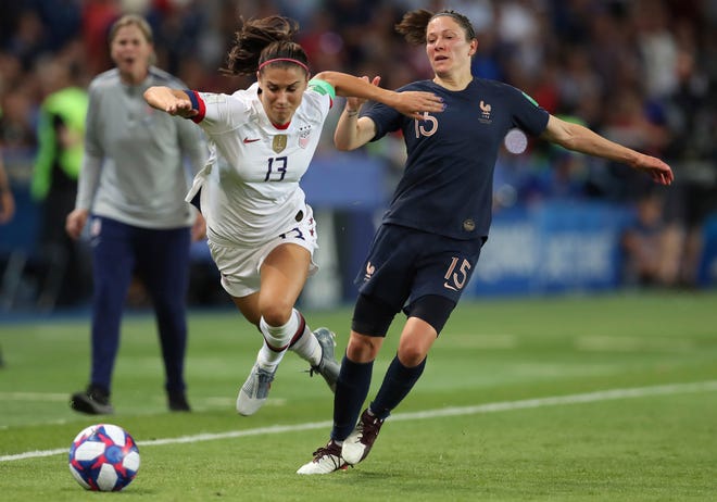 Alex Morgan (13) is tied for the Golden Boot race with five goals in the Women's World Cup, all scored in the United States' opening match against Thailand. (Associated Press/Francisco Seco)