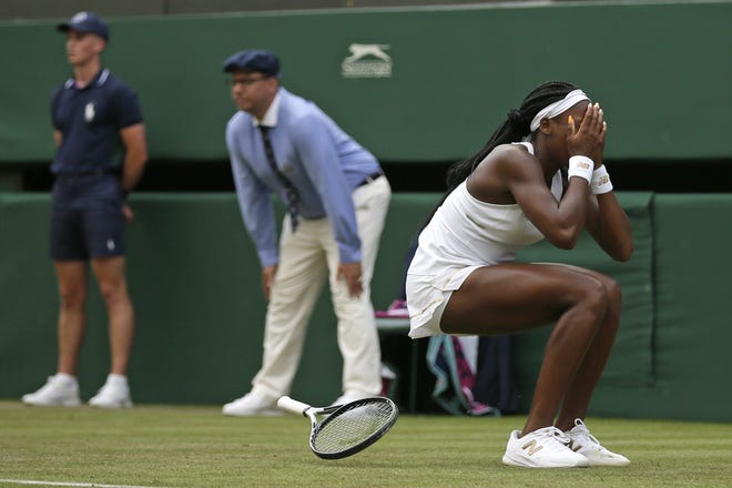 United States' Cori "Coco" Gauff reacts after beating fellow American Venus Williams in the women's singles match during day one of the Wimbledon Tennis Championships in London on Monday. [The Associated Press / Tim Ireland]