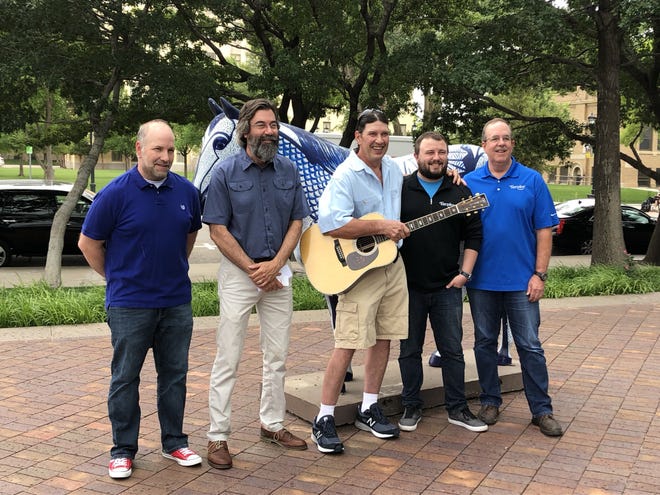 From left, Craig Vaughn with the Texas Panhandle Walk of Fame, Wes Reeves with the Friends of A.J. Swope, Joe Ed Coffman with Friends of Fogelberg, and Brad Tarpley and David Tarpley from Tarpley Music host a conference to give information about the upcoming Friends of Fogelberg concert on Tuesday at the Amarillo National Bank building in downtown Amarillo. [David Gay/Amarillo Globe-News]