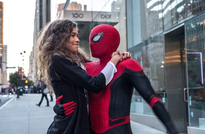 This image released by Sony Pictures shows Zendaya, left, and Tom Holland in a scene from "Spider-Man: Far From Home." (Jay Maidment/Columbia Pictures/Sony via AP)
