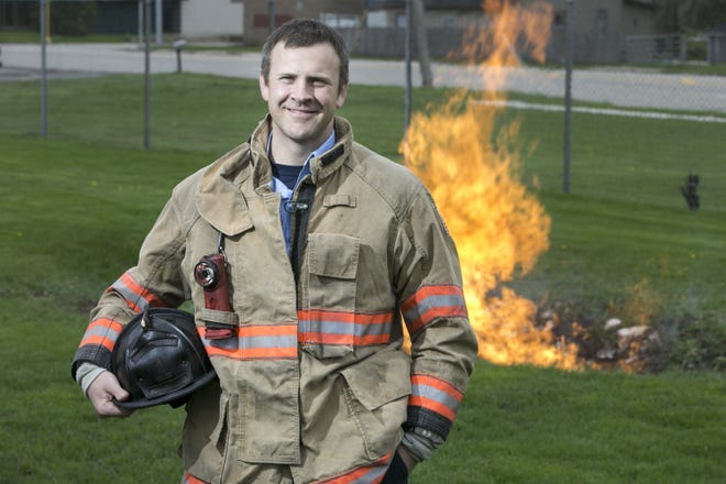 Matt Renfro, a firefighter and paramedic with Rockford Fire Department, stands for a portrait on Wednesday, May 1, 2019, at Station 6 on West State Street in Rockford. [SCOTT P. YATES/RRSTAR.COM STAFF]