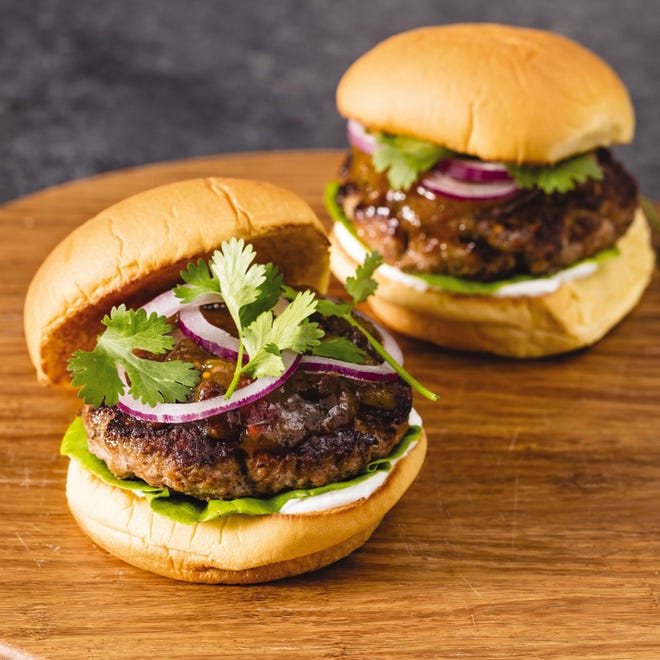 This Spiced Turkey Burger with Mango Chutney recipe appears in the cookbook "The Ultimate Burger." (Daniel J. van Ackere/America's Test Kitchen via AP)