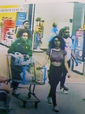 Police in Lufkin, Texas, released surveillance video from a Walmart store that they believe shows a woman who licked a half-gallon tub of Blue Bell Tin Roof ice cream and then put it back in a store freezer. [LUFKIN POLICE DEPARTMENT]