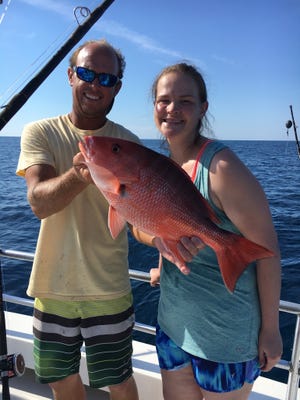 Lindsey Williams traveled from Texas to fish with family on the Endless Summer. This was one of dozens of red snapper caught, mostly by the pair, on double-hook bottom rigs. [Contributed]