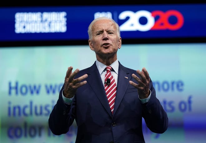 Former Vice President Joe Biden calls for universal pre-K during a National Education Association Democratic presidential candidate forum Friday in Houston. [David J. Phillip/The Associated Press]
