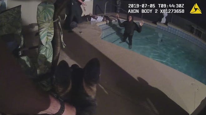 Two suspects connected to the attempted theft of multiple Mustangs from Palm Coast Ford early Friday morning were found trying to hide in a swimming pool of a home in DeLand, authorities said. [Screenshot from VCSO video]