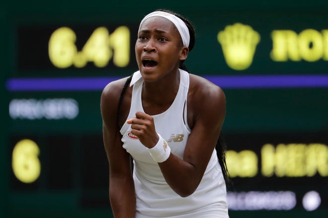 United States' Cori "Coco" Gauff reacts after winning a point against Slovenia's Polona Hercog in a Women's singles match during day five of the Wimbledon Tennis Championships in London, Friday, July 5, 2019. (AP Photo/Ben Curtis)