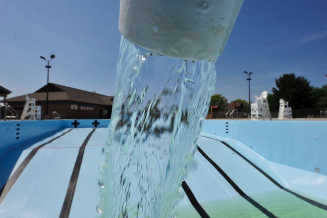 Water starts to fill Washington Park Pool in a file photo from 2018. [FRED ZWICKY/JOURNAL STAR FILE]