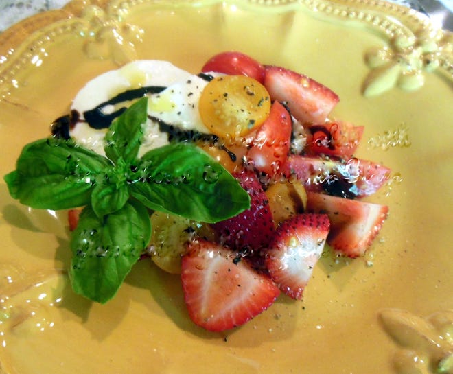 Tomato and Strawberry Salad with Goat Cheese and Balsamic Glaze. [Laura Tolbert/GADSDEN Times]