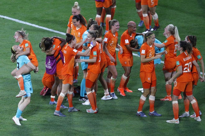 Netherlands players celebrate after beating Sweden 1-0 in their semifinal on Wednesday. Netherlands and the United States battle for the World Cup title Sunday. [The Associated Press]