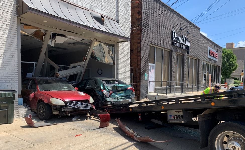 Multiple vehicles crash into downtown Tuscaloosa office