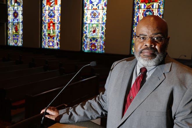 The Rev. Clinton Hubbard Jr., new senior pastor at First United Methodist Church in Tuscaloosa, will take the pulpit Sunday to bring his first message. He is photographed in the pulpit Wednesday, July 3, 2019. [Staff Photo/Gary Cosby Jr.]