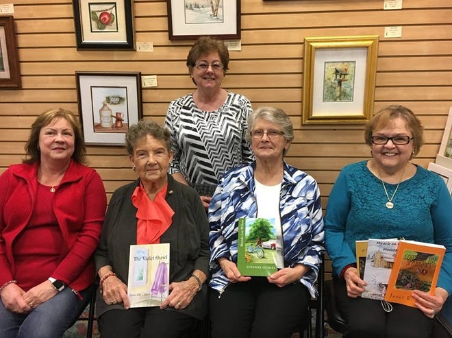 From left to right (seated): Elizabeth "Liz" Solazzo; Doris Dix Caruso; Brenda Loy Wilson; and Janet R. Sady. Artist Carolyn Teague, standing, designed the book covers.

[Photo submitted]