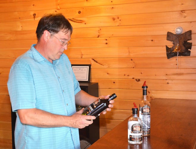Urbana Hill Distillery co-owner Dave Jamison in his tasting room at the distillery’s new location in Campbell. [STEPHEN BORGNA/THE LEADER]
