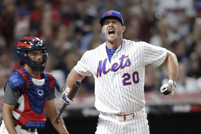 Pete Alonso, of the New York Mets, reacts during the Major League Baseball Home Run Derby on Monday in Cleveland. Alonso beat out fellow rookie Vladimir Guerrero Jr. of the Toronto Blue Jays to win the Derby and the $1 million prize. The MLB baseball All-Star Game will be played Tuesday. [The Associated Press / Tony Dejak]