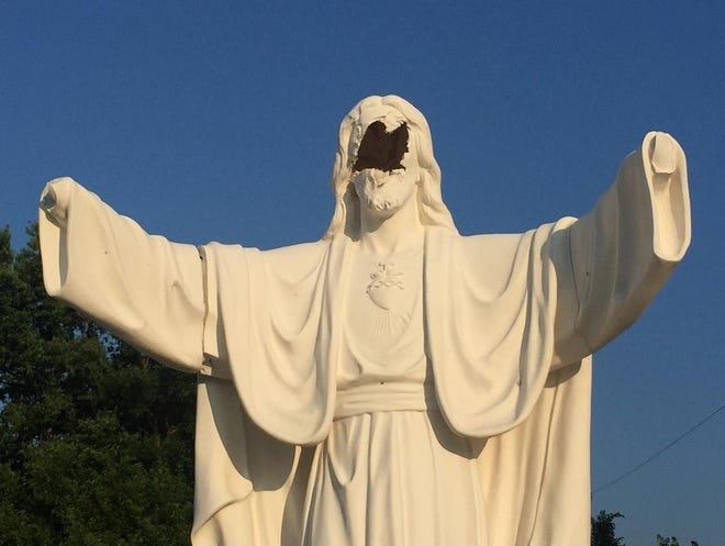 Damage to a $15,000 Jesus statue in Peoria, Ill., might be impossible to repair. [PHIL LUCIANO/PEORIA JOURNAL STAR]
