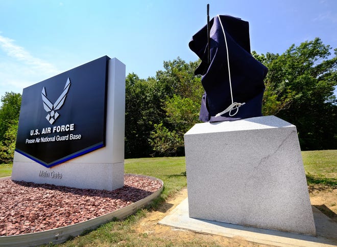 A new statue of a Minuteman remains undercover until Wednesday morning at the main gate of the U.S. Air Force Pease Air National Guard Base in Newington.

[Rich Beauchesne/Seacoastonline]