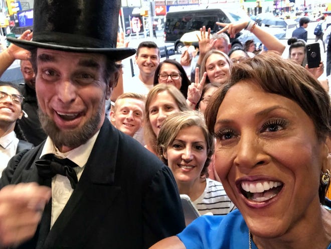 Fritz Klein, as Abraham Lincoln, meets Robin Roberts, host of ABC’s "Good Morning America" on Monday in New York. [Photo courtesy of Scott Dahl]