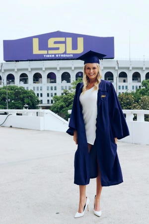 In this undated provided by Kim Searson, Brittney Searson poses at Louisiana State University in Baton Rouge, La. Searson was among those killed when a helicopter carrying billionaire coal entrepreneur Chris Cline crashed in the Bahamas on Thursday, July 4, 2019. (Kim Searson via AP)