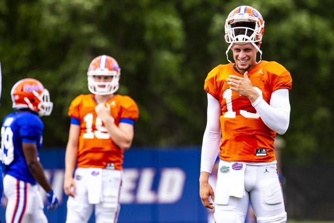 Florida quarterback Feleipe Franks (13) laughs during a practice in April. Franks must stay healthy if the Gators hope to achieve their goals in the 2019 season. [FILE]