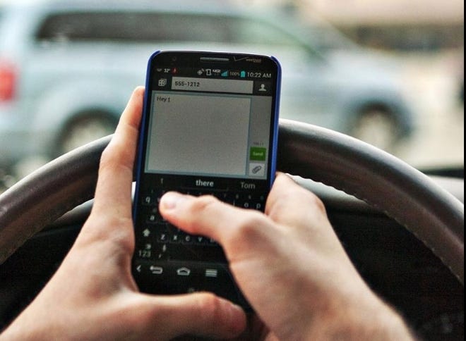 Monmouth police officers, with the use of grant money, are increasing enforcement of cellphone use while driving infractions. [STOCK PHOTO]