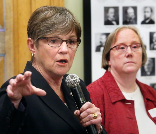 Gov. Laura Kelly, left, and DCF Secretary Laura Howard responded to a threat of legal action from the attorney general Thursday by withdrawing a controversial policy expanding eligibility for short-term food assistance to homeless veterans, people with mental health challenges and teenagers exiting foster care. [Thad Allton/The Capital-Journal]