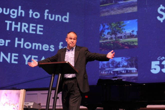 Dan Glenn, senior pastor at Stetson Baptist Church, tells the congregation about the impact their 53rd Sunday initiative, which raised over $153,000, will have in the community. [Provided photo]