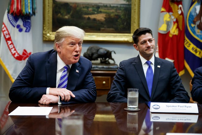 In this Sept. 5, 2018, file photo, then Speaker of the House Rep. Paul Ryan, R-Wis., listens to President Donald Trump speak during a meeting with Republican lawmakers in the Roosevelt Room of the White House in Washington. Trump unloaded an angry late-night tweetstorm on Ryan, calling Ryan a “lame duck failure” who “had the Majority and blew it away.” Ryan is very critical of Trump in the book “American Carnage” by Tim Alberta of Politico, which had excerpts in various publications this week. Alberta wrote the former speaker could not stand the idea of another two years with the president and saw retirement as the "escape hatch." (AP Photo/Evan Vucci, File)